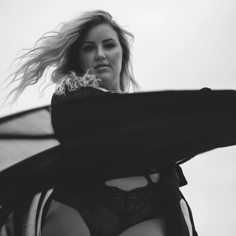 black and white photograph of rooftop boudoir photography session in new york city