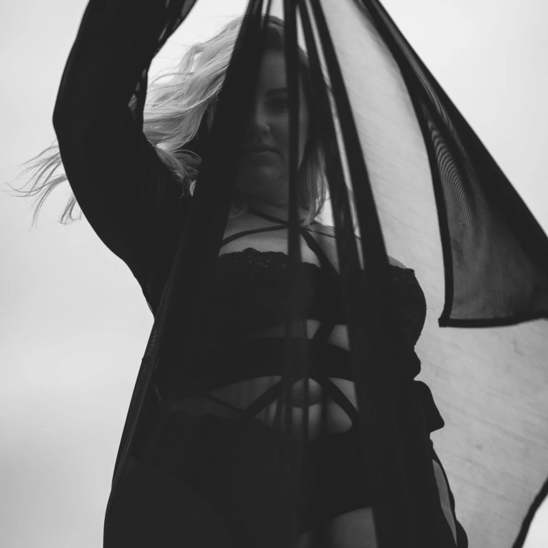 black and white photograph of rooftop boudoir photography session in new york city