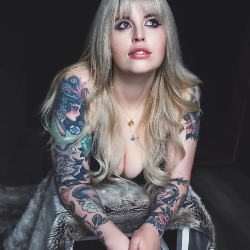blonde woman with tattoos in the south jersey boudoir photography studio