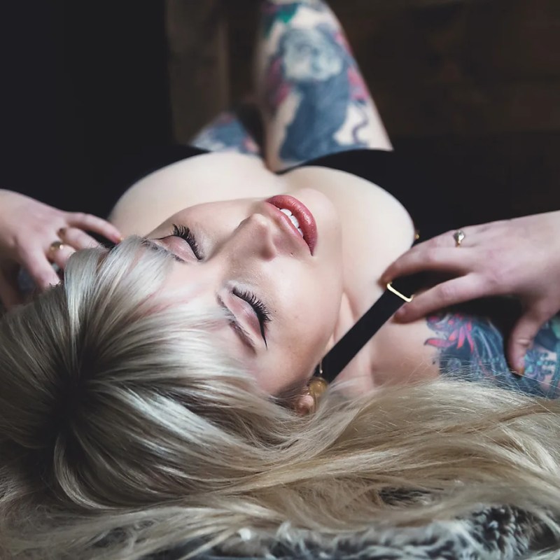 blonde woman with tattoos in the south jersey boudoir photography studio
